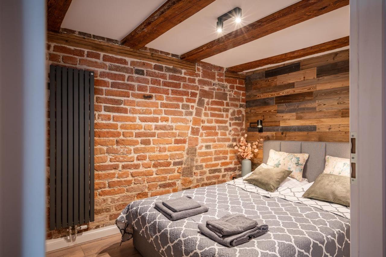 Apartamenty Stare Cegly ทอรูน ภายนอก รูปภาพ